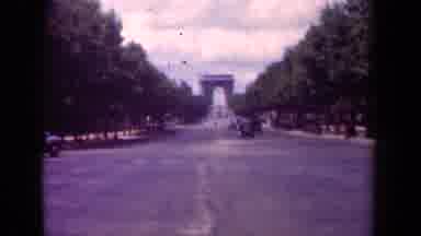 Paris France (1939): Antique Car Drives Down The Road Lined With Many Flowering