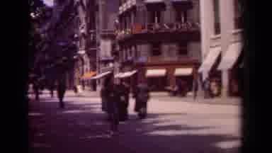 Paris France (1939): People Walking Around Downtown And Cars Driving Through The
