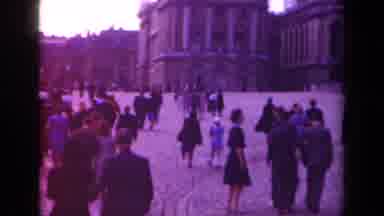 Paris France (1939): Crowds Walking Outside On Cobblestone Paths Of Decorative And