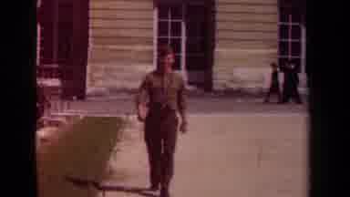Paris France (1939): A Soldier And A Group Of People Hanging Out In Their Town