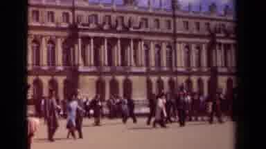 Paris France (1939): A Crowd Of People Slowly Walking Away From A Huge Building