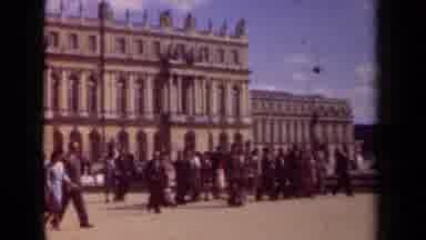 Paris France (1939): Large Group Of People Walks By A Bunch Of Historic Looking