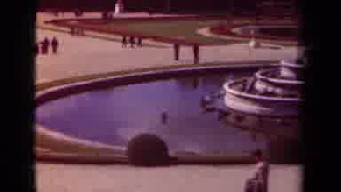 Paris France (1939): People Walk Around And Gather To See The Water Fountain