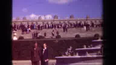 Paris France (1939): People Gather In Front Of A Large Building Structure With A