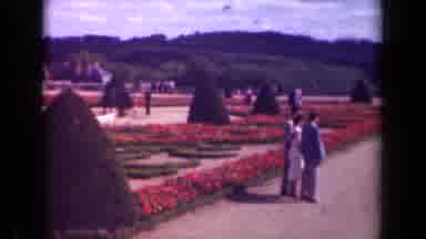 Paris France (1939): Red Flowers Triangle Green Trees Topiary Gravel Gardens Round
