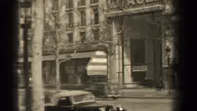 Paris France (1947): Distant Individuals Walking Downtown While Early Model