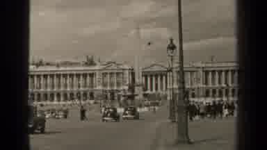 Paris France (1947): Many Cars Are On The Road Front Of The Building While People