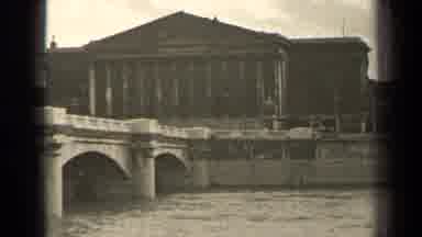 Paris France (1947): A View Of Cars Driving On An Old Bridge