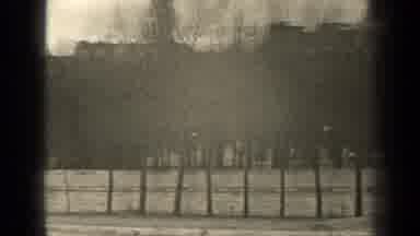 Paris France (1947): An Open Place With Dry Trees And A Bridge In Which They Focus