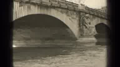 Paris France (1947): Water Calmly Running Under What Appears To Be An Old Bridge