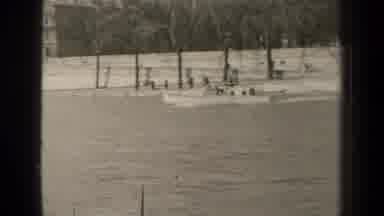 Paris France (1947): A Boat Moves Swiftly Through A Body Of Water An Urban Canal