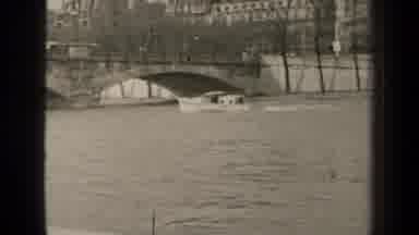 Paris France (1947): A Black And White Image Of A Boat Out On The Water