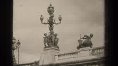 Paris France (1947): Man Looking Up At Lion Angel Behind It Cherubs And A Woman