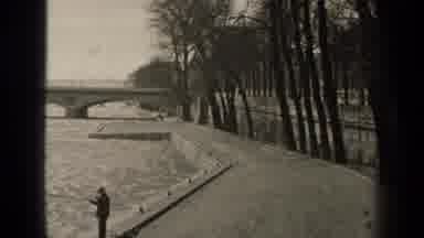 Paris France (1947): Black And White Video Of A Man Standing Next To A Body Of