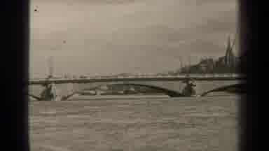 Paris France (1947): Black And White Footage Of A Stone Bridge And People Walking