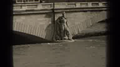 Paris France (1947): Soldier Statue Watches Flood Waters Rise As Bus Rolls Across