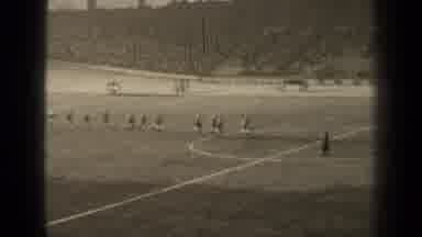 Paris France (1947): A Team Jogging Onto The Field
