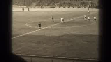 Paris France (1947): Football Player Running Through The Field In Black And White