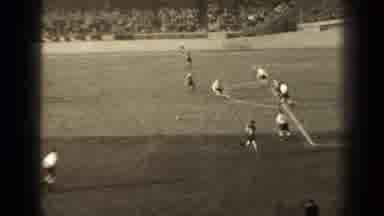 Paris France (1947): Professional Soccer Players Move The Ball Back And Forth