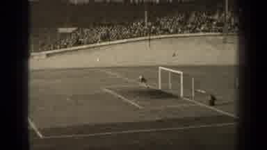 Paris France (1947): Soccer Player Aggressively Kicking The Soccer Ball To His