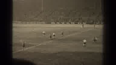 Paris France (1947): Two Soccer Teams Playing In Front Of A Huge Stadium Full Of