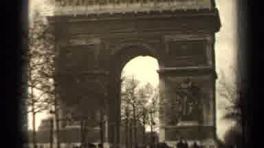 Paris France-1947: Imposing Archway Standing Over A City Street Filled With Pedestrians