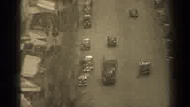 Paris France (1947): Cars Driving Down A Street With Buildings On Both Sides And