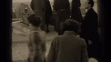 Paris France (1947): Woman Walks In The Wind Across A Platform Towards A Crowd Of