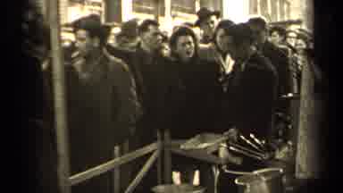 Paris France-1947: Large Crowd Shuffles Through City While Others Look On