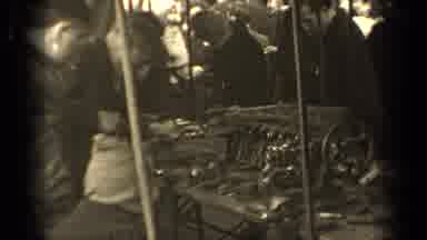 Paris France (1947): A Group Of People Gathered Around A Man Shining Something In