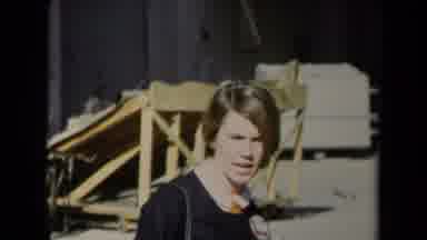 Los Angeles California USA (1967): Woman Campaigning For Something While A Crown