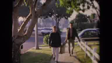 Los Angeles California USA (1967): Two Young Gentlemen Carrying A Metal Ladder