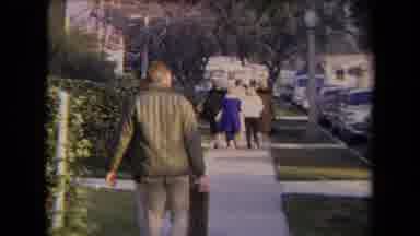 Los Angeles California USA (1967): People Walking And Gathering For A Town Parade