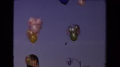Los Angeles California USA (1967): Little Boy Watching Two Balloons Floating In