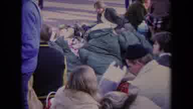 Los Angeles California USA (1967): Camera Zooms In A Curious Green Coat That