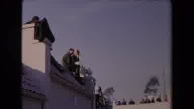 Los Angeles California USA (1967): People Sit In The Top Of The Building