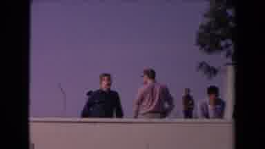 Los Angeles California USA (1967): Police Officer And Another Man Overlooking A