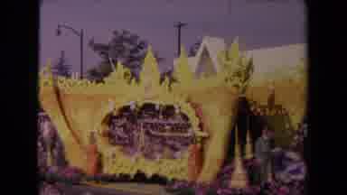 Los Angeles California USA (1967): Foreign Float Goes Through Parade Showing Off