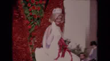 Los Angeles California USA (1967): Woman On A Parade Float Waving To A Crowd Of