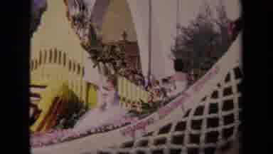 LOS ANGELES CALIFORNIA USA-1967: Large Floral Parade Float With Pipe Organ And Woman Waving