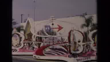 Los Angeles California USA (1967): Large Parade Float Rolls Down The Road As An