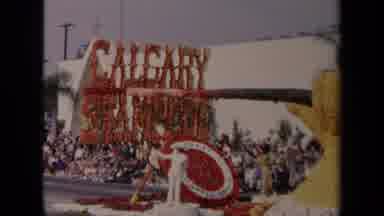 Los Angeles California USA (1967): A Man Dressed In White In A Float Waving To The
