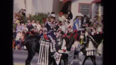 LOS ANGELES CALIFORNIA USA-1967: Procession Of Dressed-Up Cowboys Lead