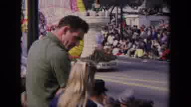 Los Angeles California USA (1967): Father And Child Watching A Dragon Float In A