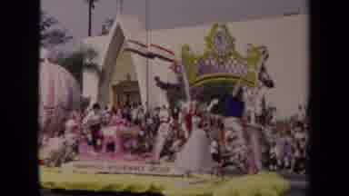 Los Angeles California USA (1967): Large Decorated Float Drives By As Several