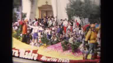 Los Angeles California USA (1967): Sierra Madre Parade Float Driving Down A Street