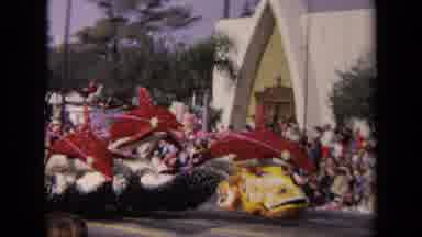 Los Angeles California USA (1967): A Parade Has A Dragon Moving Across The Road In