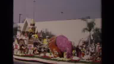 Los Angeles California USA (1967): Float Of Little Town Dragged By Giant Glides