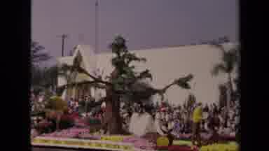 Los Angeles California USA (1967): Float Of Tree And Campsite Goes By People As