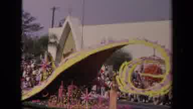 Los Angeles California USA (1967): Woman Riding A Pink And Yellow Float In A